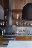 Modern home with Kitchen, Wall Oven, Cooktops, Metal Counter, Wood Cabinet, and Pendant Lighting. Kitchen Photo 8 of La Boyita