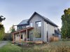 Modern home with Exterior, House Building Type, Shingles Roof Material, Stone Siding Material, Shed RoofLine, A-Frame RoofLine, and Wood Siding Material. South east approach Photo of The North Bridge Residence