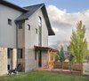 Modern home with Outdoor, Decking Patio, Porch, Deck, Horizontal Fences, Wall, Back Yard, and Gardens. Back yard looking South at Mt. Sopris Photo 4 of The North Bridge Residence