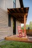 Modern home with Exterior, Wood Siding Material, Metal Roof Material, and Shed RoofLine. West facing porch at garden Photo 6 of The North Bridge Residence