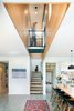 Modern home with Staircase, Wood Tread, and Metal Railing. Entry looking towards stair and bridge Photo 7 of The North Bridge Residence