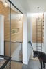 Modern home with Staircase, Wood Tread, and Metal Railing. Upstairs at the bridge Photo 11 of The North Bridge Residence