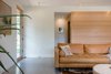 Modern home with Living Room, Sofa, Ceiling Lighting, and Concrete Floor. Living Room view Photo 12 of The North Bridge Residence