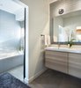 Modern home with Bath Room, Laminate Counter, Concrete Floor, Vessel Sink, Alcove Tub, Subway Tile Wall, One Piece Toilet, and Open Shower. Kid's Bathroom Photo 18 of The North Bridge Residence