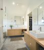 Modern home with Bath Room, Vessel Sink, Wood Counter, Concrete Floor, Full Shower, and Ceiling Lighting. Master Bathroom Photo 20 of The North Bridge Residence