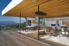 Modern home with Dining Room. The living and dining rooms open up to the outdoors. Photo 7 of Tiburon Home