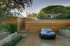Concealed garage doors. Photo 11 of Tiburon Home modern home