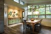 Modern home with Dining Room, Table, and Pendant Lighting. Dining room and foyer Photo 15 of A Modern 1954 Plantation Style Home on Maui
