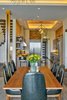 Modern home with Dining Room, Table, Accent Lighting, Chair, Dark Hardwood Floor, Recessed Lighting, and Pendant Lighting. Dining Room Photo 6 of Maui Beachfront Villa