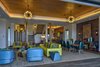 Modern home with Living Room, Coffee Tables, Ceiling Lighting, Pendant Lighting, Dark Hardwood Floor, End Tables, Sofa, Recessed Lighting, Console Tables, and Chair. Great Room Photo 4 of Maui Beachfront Villa
