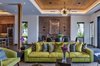 Modern home with Living Room, Accent Lighting, Sofa, Recessed Lighting, Chair, Pendant Lighting, Coffee Tables, Dark Hardwood Floor, and Console Tables. Great Room Photo 3 of Maui Beachfront Villa