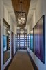 Modern home with Hallway, Rug Floor, and Dark Hardwood Floor. Front Entrance Photo 10 of Maui Beachfront Villa