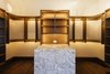 Modern home with Bedroom, Recessed Lighting, Ceiling Lighting, Pendant Lighting, Dark Hardwood Floor, and Accent Lighting. Designer Closet Photo 19 of Maui Beachfront Villa