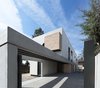 Modern home with Garage and Attached Garage Room Type. load-bearing beam structures and concrete walls mark the limits of the structure Photo 2 of iA_house