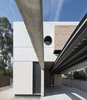 Modern home with Doors, Exterior, Wood, and Folding Door Type. geometry opposes topology to defy space constraints in CASA IA. The lower structures have sliding steel panels in the ventilated chambers. Photo 3 of iA_house