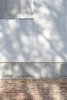 Modern home with Exterior, Metal Siding Material, Brick Siding Material, and Concrete Siding Material. facade detail: Concrete: in-situ beams and prefabricated + brickworks: concrete Photo 8 of iA_house