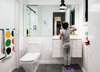 Modern home with Engineered Quartz Counter, Undermount Sink, Ceiling Lighting, and Light Hardwood Floor. Kid's Bathroom Photo 13 of Roslyn Road Residence
