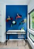 Modern home with Chair, Ceiling Lighting, and Light Hardwood Floor. A pop of color, and a window to reflect out to in the son's bedroom. Photo 16 of Roslyn Road Residence