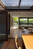 Modern home with Dining Room, Table, Chair, and Medium Hardwood Floor. Visual connections between dining, living, and garden beyond. Photo 10 of Kihilla
