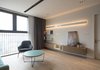 Modern home with Living Room, Ceiling Lighting, Light Hardwood Floor, Coffee Tables, and Chair. Livingroom Photo 2 of A.D02