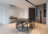 Modern home with Dining Room, Chair, Light Hardwood Floor, Ceiling Lighting, and Table. Dining Photo 5 of A.D02