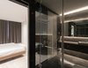 Modern home with Bath Room, Wall Mount Sink, Ceramic Tile Wall, Ceramic Tile Floor, One Piece Toilet, Tile Counter, and Ceiling Lighting. View from master bathroom Photo 14 of A.D02