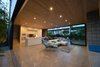 Modern home with Living Room, Chair, Ottomans, and Recessed Lighting. living room view Photo of HLJH
