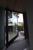 Modern home with Doors, Exterior, Metal, and Swing Door Type. front entry Photo 6 of HLJH