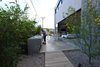 Modern home with Outdoor, Side Yard, Garden, Trees, Shrubs, Hardscapes, Walkways, Wood Patio, Porch, Deck, and Concrete Patio, Porch, Deck. cast in place concrete grill Photo 7 of HLJH