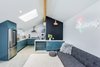 Modern home with Kitchen, Marble Counter, Colorful Cabinet, Range Hood, Subway Tile Backsplashe, Recessed Lighting, Undermount Sink, Rug Floor, Concrete Floor, Refrigerator, Wall Oven, Range, and Wall Lighting. If your kitchen layout is already serving you well, focus on upgrading appliances, cabinetry, and finishings rather than rearranging everything. Photo of Guest House and Work Space - Los Angeles