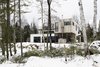 Modern home with Exterior, House Building Type, Flat RoofLine, Wood Siding Material, Metal Siding Material, and Cabin Building Type. South façade Photo 2 of Maison Lac Brûlé
