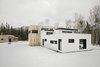 Modern home with Exterior, House Building Type, and Metal Siding Material. Volumes of roofs with lines accentuated by the cutting of black aluminum Photo 5 of Maison Lac Brûlé
