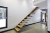Modern home with Staircase, Wood Tread, and Metal Railing. Staircase Photo 11 of Maison Lac Brûlé