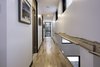 Modern home with Hallway and Light Hardwood Floor. Corridor view Photo 13 of Maison Lac Brûlé