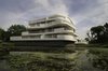 Modern home with Exterior, Apartment Building Type, Green Roof Material, Wood Siding Material, Concrete Siding Material, Stucco Siding Material, Stone Siding Material, Glass Siding Material, and Flat RoofLine. villa A _ south facade Photo 4 of De Haaf Bergen, The Netherlands