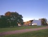 Modern home with Exterior, Glass Siding Material, House Building Type, Metal Siding Material, Ranch Building Type, Wood Siding Material, and Metal Roof Material. Lummis Residence, Shelby Photo 2 of Lummis Residence