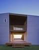 Modern home with Exterior, House Building Type, Ranch Building Type, Metal Roof Material, Metal Siding Material, Glass Siding Material, and Wood Siding Material. Lummis Residence, Shelby Photo 4 of Lummis Residence