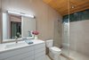 Modern home with Bath Room, Concrete Counter, Porcelain Tile Floor, Recessed Lighting, Wall Lighting, Porcelain Tile Wall, and Two Piece Toilet. Bathroom Photo 11 of Mike's Hammock
