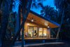 Modern home with Exterior, Metal Roof Material, Cabin Building Type, Wood Siding Material, and Shed RoofLine. Rear Elevation Photo 14 of Mike's Hammock