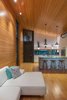 Modern home with Living Room, Sectional, Track Lighting, and Medium Hardwood Floor. Great Room Photo 3 of Mike's Hammock