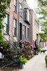 Modern home with Exterior, House Building Type, Shingles Roof Material, Brick Siding Material, and Flat RoofLine. Sidewalk view Photo of Brooklyn Upside Down with Views