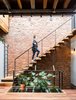 Modern home with Staircase, Wood Tread, and Metal Railing. Stairs to roof, glass floor provides light to floor below Photo 5 of Brooklyn Upside Down with Views