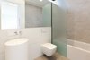 Modern home with Bath Room, Vessel Sink, Ceramic Tile Floor, Recessed Lighting, Glass Tile Wall, and One Piece Toilet. Powder room Photo 12 of Kelly House