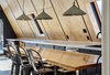 Modern home with Kitchen, Light Hardwood Floor, Wood Cabinet, Dishwasher, Drop In Sink, Pendant Lighting, and Concrete Counter. Live edge dining table / kitchen island by Timberforge Woodworks Photo 5 of Lokal A-Frame