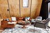 Modern home with Living Room, Light Hardwood Floor, Sectional, Coffee Tables, Floor Lighting, End Tables, Chair, Lamps, and Rug Floor. Living room with furnishings by Article & custom wagon wheel table by Ovuud Photo 3 of Lokal A-Frame