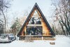 Front facade in snow Photo 20 of Lokal A-Frame modern home