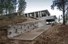 Modern home with Exterior, Concrete Siding Material, Beach House Building Type, Glass Siding Material, House, and Metal Siding Material. Wein House - Besonías Almeida arquitectos Photo of Wein House