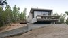 Modern home with Exterior, House, Concrete Siding Material, Glass Siding Material, and Beach House Building Type. Wein House - Besonías Almeida arquitectos Photo 4 of Wein House