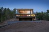 Modern home with Exterior, House, Beach House Building Type, Concrete Siding Material, Metal Siding Material, and Glass Siding Material. Wein House - Besonías Almeida arquitectos Photo 17 of Wein House