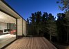 Modern home with Exterior, House, Beach House Building Type, Concrete Siding Material, Metal Siding Material, Glass Siding Material, and Wood Siding Material. Wein House - Besonías Almeida arquitectos Photo 19 of Wein House